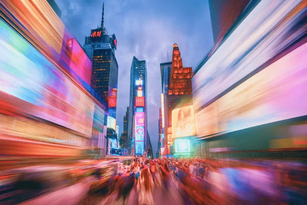 Vibrant city lights and billboards symbolizing AI-powered systems for scaling global brands with consistency.